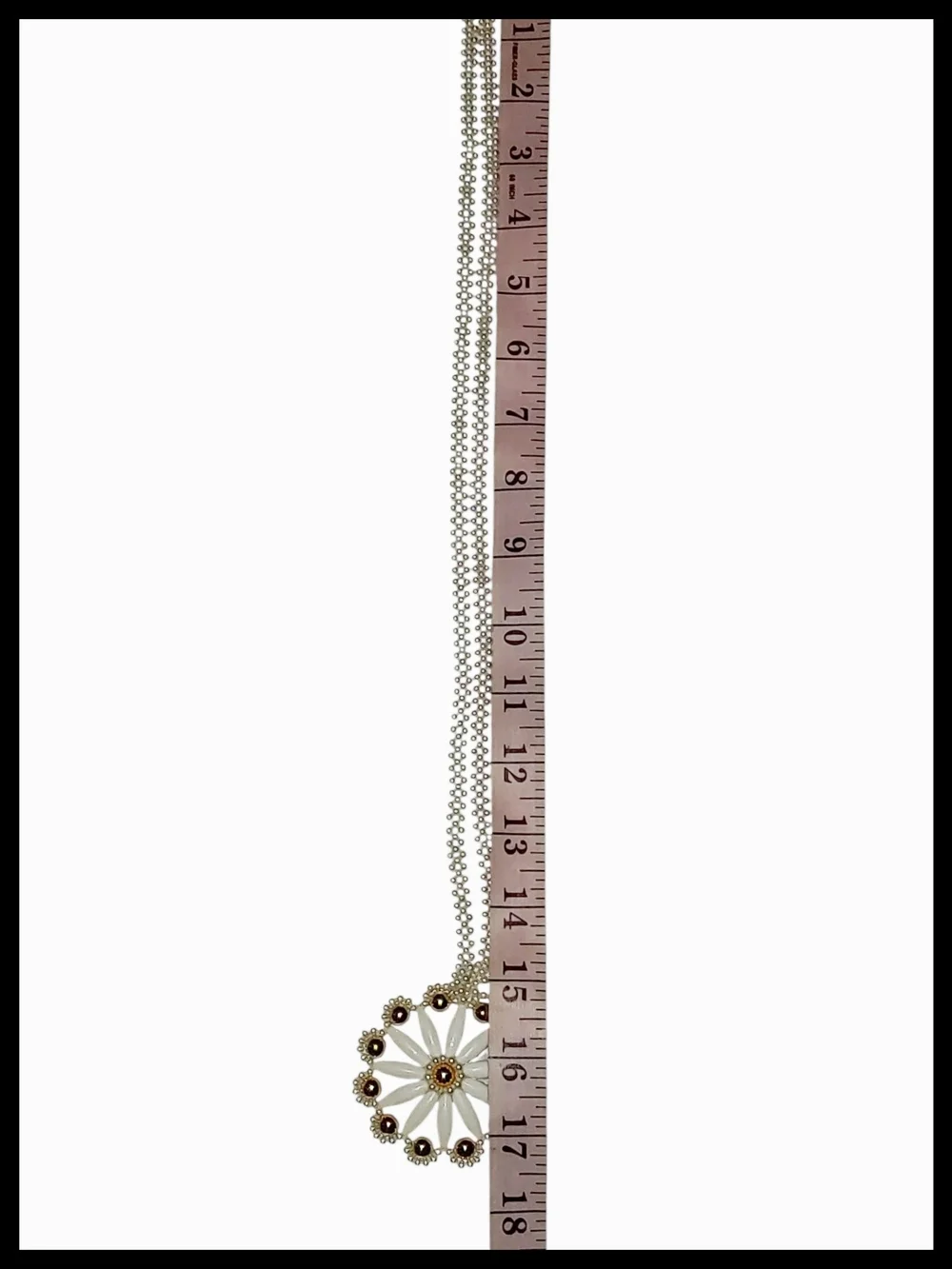 White and Gold Tone Floral Pendant Necklace